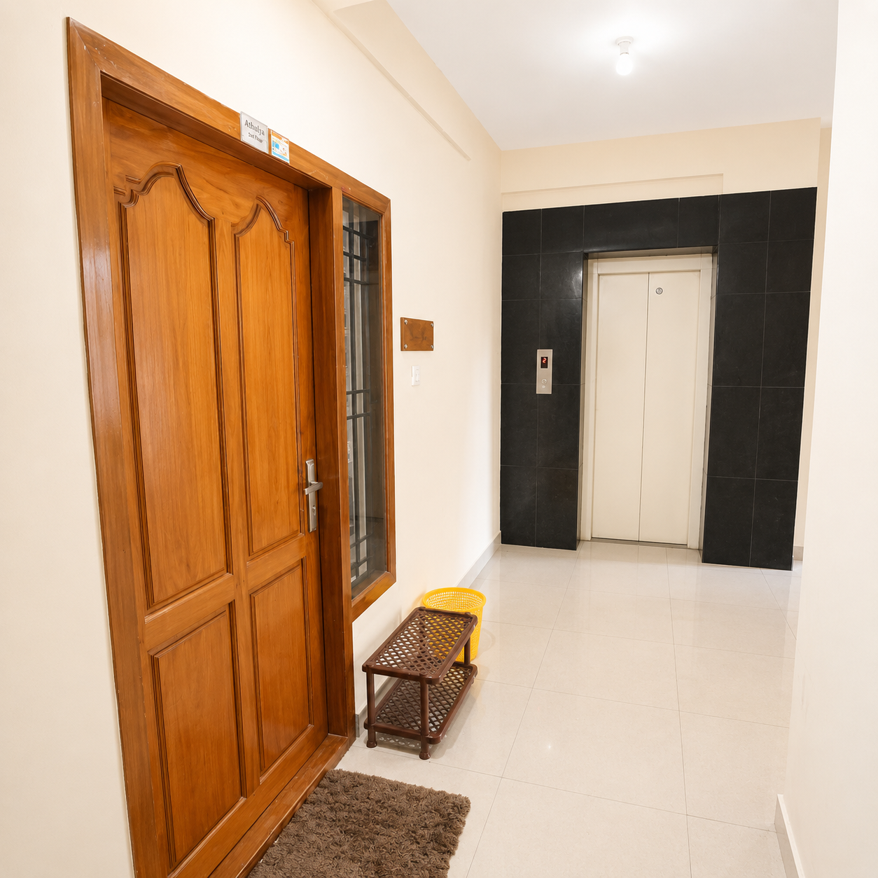 Corridor and elevator access at Hima Havens Guruvayur Homestay